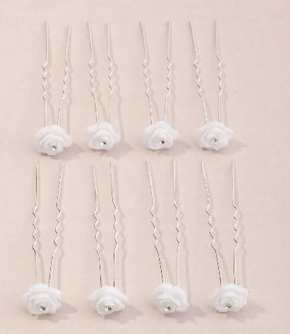 Gancho de cabelo com flores brancas